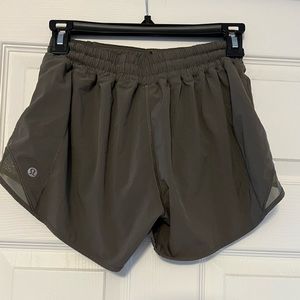 Lululemon Olive green 4” Hotty Hot low rise shorts. Size 4.